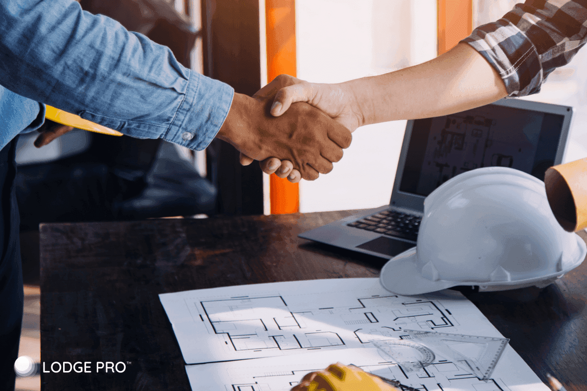 Construction business owner reviewing cash flow optimisation dashboard for active projects